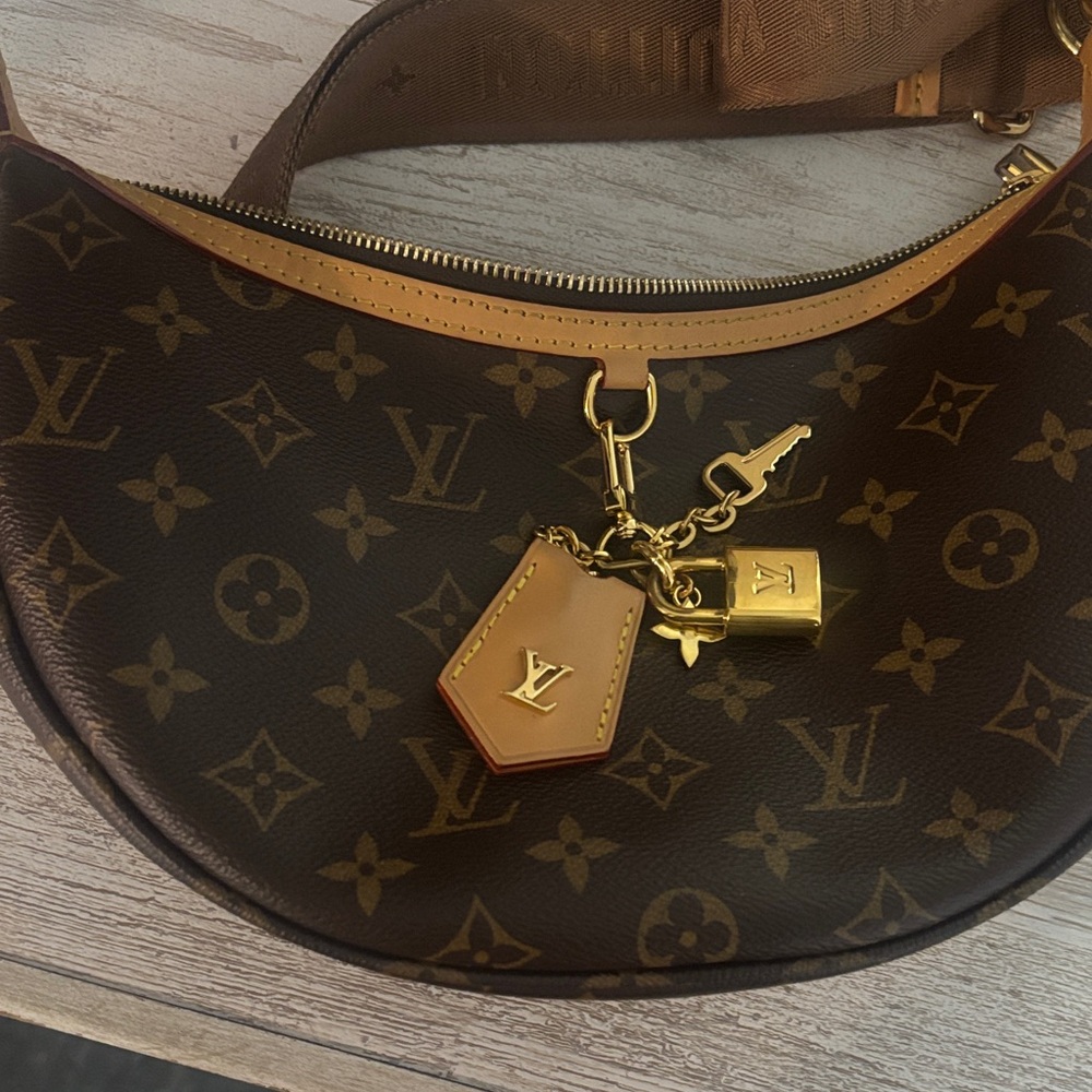 Louis Vuitton Monogram Half-Moon Bag with Gold Accents. I wore this 4 times